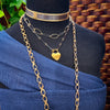 We've all fought battles. And won. I created Embrace to honor the battles. The handcrafted links are interlocked and symbolize the power of love and prayer. The power of loved ones and friends that stand by  you during your raging storms. Choose from a locking submissive style or traditional.