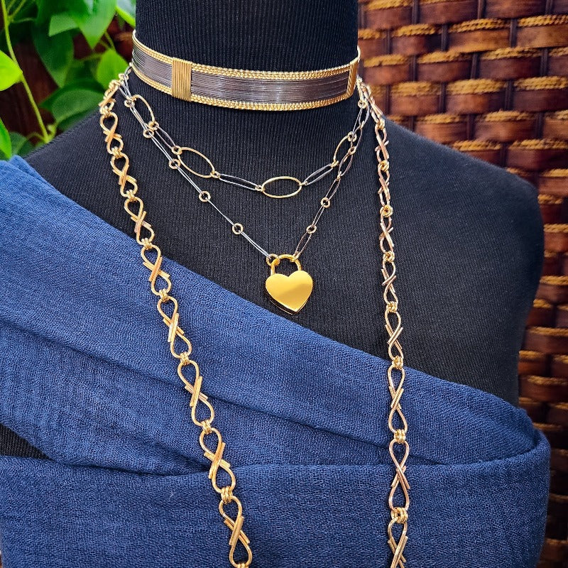 We've all fought battles. And won. I created Embrace to honor the battles. The handcrafted links are interlocked and symbolize the power of love and prayer. The power of loved ones and friends that stand by  you during your raging storms. Choose from a locking submissive style or traditional.