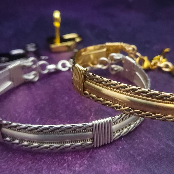 Bold, dramatic and luxurious, this locking submissive bracelet is from our BABYLON Collection. Pure luxury in BDSM jewelry.  Babylonian jewelry was not only a way to add style but also represented wealth, status, and spiritual reverence. By My Secret Heart Studios.