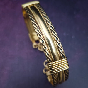 Bold, dramatic and luxurious, this traditionally styled bracelet is from our BABYLON COLLECTION. Babylonian jewelry was not only a way to add style but also represented wealth, status, and spiritual reverence. An exquisite craft, attention to detail, and artistic prowess left a permanent impression in the world of ancient jewelry.