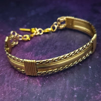 Bold, dramatic and luxurious, this KEY KEEPER BRACELETS is from our BABYLON COLLECTION. A detachable chain safely holds the key to Your submissive's lock.  Lobster clasps clip into rings attached to the cuff, which makes removing the chain and key simple. Never lose that all important, tiny key!  By My Secret Heart Studios