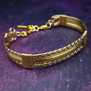 Bold, dramatic and luxurious, this KEY KEEPER BRACELETS is from our BABYLON COLLECTION. A detachable chain safely holds the key to Your submissive's lock.  Lobster clasps clip into rings attached to the cuff, which makes removing the chain and key simple. Never lose that all important, tiny key!  By My Secret Heart Studios