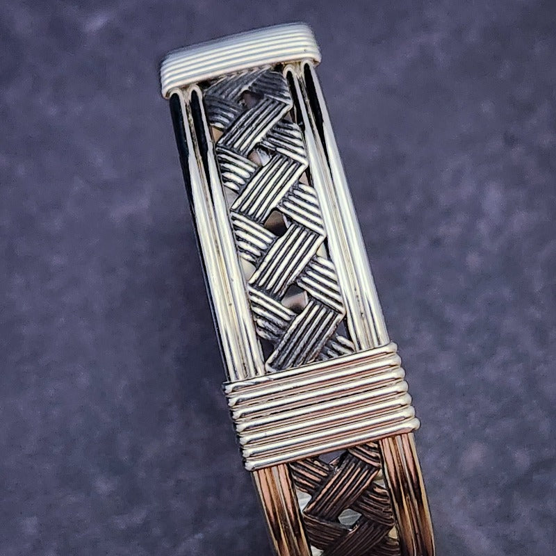Our new favorite Barekk Collection features sterling silver in a timeless X frame work with sterling silver accents for a luxurious yet daring look. With its intricate design, this bracelet communicates Ownership in a stylish, understated way.