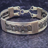Our new favorite Barekk Collection features sterling silver in a timeless X frame work with sterling silver accents for a luxurious yet daring look. With its intricate design, this bracelet communicates Ownership in a stylish, understated way.