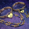 Adorn yourself with this beautiful handcrafted silver and crystal chain that can be transformed into stylish handcuffs and ankle restraints, a chic locking collar, or a decorative necklace for Dominants. Connect it to the back of a collar for a sexy look, and give a tug on the chain for an extra choking sensation. With its versatile appeal, CONVERSION CHAIN, BLACK ONYX & STERLING will certainly be a beloved accessory! By My Secret Heart Studios