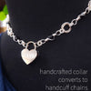 Adorn yourself with this beautiful handcrafted silver and onyx chain that can be transformed into stylish handcuffs and ankle restraints, a chic locking collar, or a decorative necklace for Dominants. Connect it to the back of a collar for a sexy look, and give a tug on the chain for an extra choking sensation. With its versatile appeal, CONVERSION CHAIN, BLACK ONYX & STERLING will certainly be a beloved accessory! By My Secret Heart Studios
