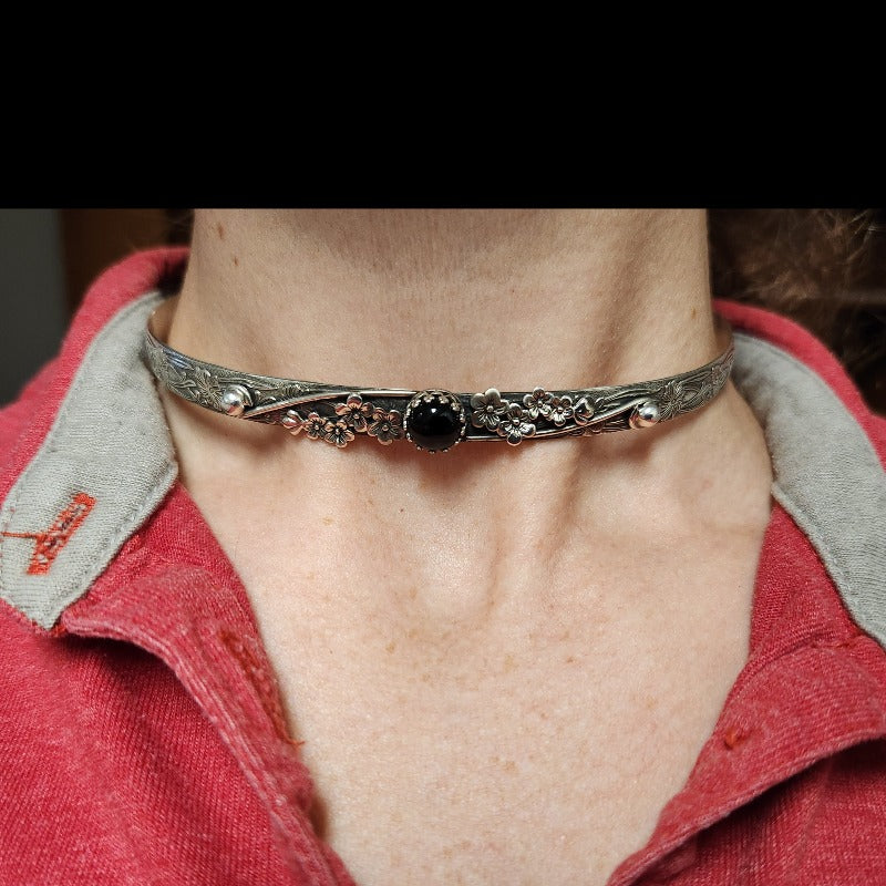 A woman in a red shirt is wearing the PRIVATE LISTING for HF, Black Cherry Blossoms Collection choker from MY SECRET HEART STUDIOS.