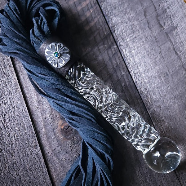 This limited edition Flogger, the Celtic Shield, is graced with a striking black and silver medallion full of mystic and heritage, showcasing a Celtic Shield and set with a Black Opal. For the 2023 holidays, only 7 of these have been created! Hurry and get yours now. Ready To Ship!