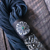 This limited edition Flogger, the Celtic Shield, is graced with a striking black and silver medallion full of mystic and heritage, showcasing a Celtic Shield and set with a Black Opal. For the 2023 holidays, only 7 of these have been created! Hurry and get yours now. Ready To Ship!
