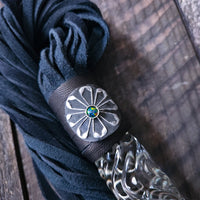 This limited edition Flogger, the Celtic Shield, is graced with a striking black and silver medallion full of mystic and heritage, showcasing a Celtic Shield and set with a Black Opal. For the 2023 holidays, only 7 of these have been created! Hurry and get yours now. Ready To Ship!