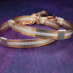 Our GODIVA bracelets are big, bold and dramatic, yet timeless and classic. Precious metals of Rose Gold and Sterling Silver embrace to create a seductive design that's big, bold and dramatic, yet is beautifully classic and timeless. By My Secret Heart Studios