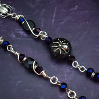 Crafted with My Secret Heart's exquisite and discreet grace, this one-of-a-kind design combines dark and creepy fashion with an air of submissive mystery. Decorated with sterling silver spiders and beetles, black onyx, and midnight Iris crystals, this exquisite locking kitten bell will surely make your kitten stand out.