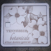 Tennessee Botanicals artisan domino game set with floral design on a textured surface