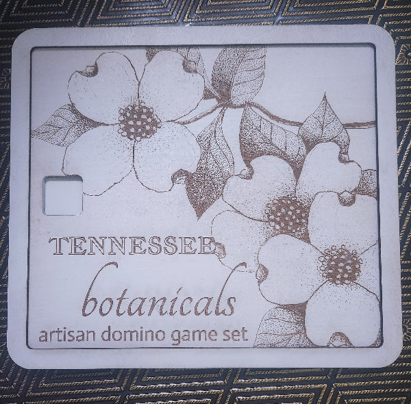Tennessee Botanicals artisan domino game set with floral design on a textured surface
