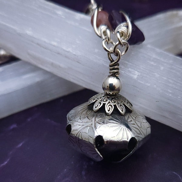An original, one of a kind design, our locking submissive kitten bell is handcrafted with all the grace and discretion that My Secret Heart is known for. Wear this as a fashion piece or as a subtle submissive or pet play collar, either way you will look amazing!  Crafted in luxurious sterling silver and embellished with pretty pink Rhodochrosite, Amethyst nuggets, pearls and stardust beads, this will make your kitten feel so pretty! 