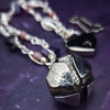 An original, one of a kind design, our locking submissive kitten bell is handcrafted with all the grace and discretion that My Secret Heart is known for. Wear this as a fashion piece or as a subtle submissive or pet play collar, either way you will look amazing!  Crafted in luxurious sterling silver and embellished with pretty pink Rhodochrosite, Amethyst nuggets, pearls and stardust beads, this will make your kitten feel so pretty! 
