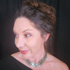 The KYRO LOCKING SUBMISSIVE COLLAR is created to accommodate interchangeable medallions, which can be effortlessly changed. In a heartbeat, you can transform from gothic to girly, uptown to downtown, or casual to dramatic. A collar so discreet, so unique in appearance, no one will ever guess that it's a statement of ownership. If they don't know, they will never guess, lol. This one features a Spiky Burst with Rainbow Moonstone. By My Secret Heart Studios