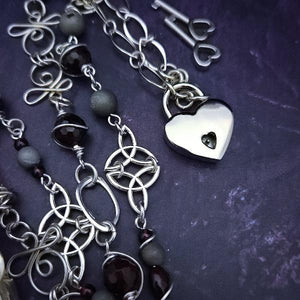 THE ARTISAN CHAIN is asymetrical and features incredible faceted garnets and grey druzies, all wrapped in sterling silver. The handcrafted links make this a true artisan piece you'll treasure for years. Hefty weight. Silver Star Sapphire, Garnets and Grey Druzy, One of a Kind by My Secret Heart Studios