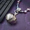 An original, one of a kind design, our locking submissive kitten bell is handcrafted with all the grace and discretion that My Secret Heart is known for. Wear this as a fashion piece or as a subtle submissive or pet play collar, either way you will look amazing!  Sumptuous fresh water pearls and sterling silver give this piece a luxurious finish, guaranteed to make your kitten purr with delight! By My Secret Heart Studios