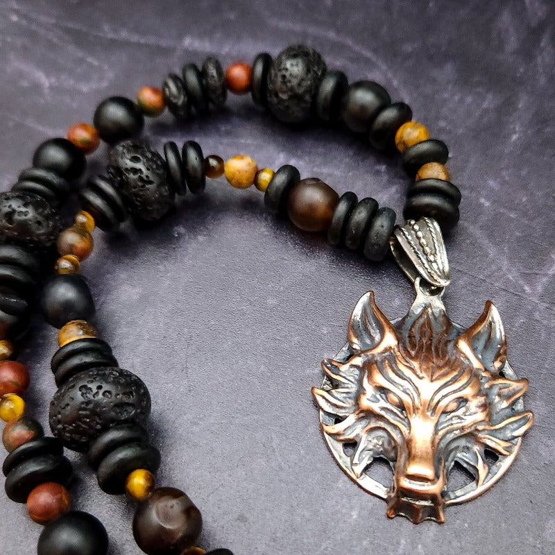 Unleash your inner warrior with the PROWLER Wolf Necklace! This one-of-a-kind necklace features an ultra-durable stainless steel wolf pendant, paired with rare ancient-looking gemstones. Conquer any challenge with its bold asymmetrical design, transporting you to the rugged land of the Nordic spirit. Dare to take a leap of faith and unlock your strength!
