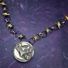 The locking submissive barbed collar can be worn with or without the medallion, and the medallion can be worn on other collars and chains. By My Secret Heart Studios