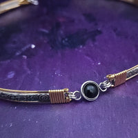 Our ‘WILD FLOWER’ collection speaks of rambling cottage gardens. Sensual and romantic. This artisan BDSM submissive jewelry is handcrafted in a floral pattern of sterling silver. The FLEXIBLE Wild Flower Locking BDSM Submissive Collar is made in two pieces, allowing it to be flexible instead of rigid. This romantic piece is Sterling Silver accented with 14k Gold Filled accents. 