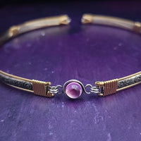 Our ‘WILD FLOWER’ collection speaks of rambling cottage gardens. Sensual and romantic. This artisan BDSM submissive jewelry is handcrafted in a floral pattern of sterling silver. The FLEXIBLE Wild Flower Locking BDSM Submissive Collar is made in two pieces, allowing it to be flexible instead of rigid. This romantic piece is Sterling Silver accented with 14k Gold Filled accents. 