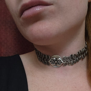 CELTIC HEARTS Submissive Locking Collar.  Every single link is handcrafted in sterling silver, then interlocked into the next link. This creates a very strong and substantial collar. You will love the weight and sensual feel of warm metal caressing the neck. Over 3 ounces of sterling. Can be worn locked or with a 'day clasp' for discretion. By My Secret Heart Studios