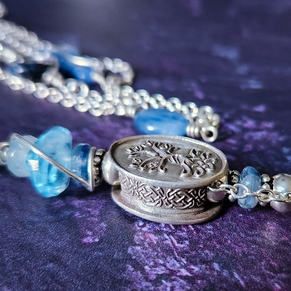 THE HANDCRAFTED ARTISAN CELTIC KNOT BEAD is hand built in fine silver art clay. Embellished on one side with the Celtic Knot design, and other side features an ancient Celtic Tree of Life. Handcrafted Artisan Gemstone Chain. By My Secret Heart Studios