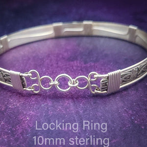 Locking Jump Ring for Collars, Cuffs and Chains. Devotees of our product will appreciate the "Click & Lock" feature of this jump ring, allowing for a secure and simple closure without the need for any soldering. Considered a permanent lock, you will have to cut the ring to remove. 10mm Round, Sterling Silver.