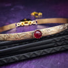 Our Soft and Sweet submissive collar is the epitome of feminine grace. Handcrafted with loving care, this artisan-made 14k gold filled submissive collar radiates femininity with its floral sterling silver pattern and a hand-set 8mm Garnet. Beautifully feminine and romantic.