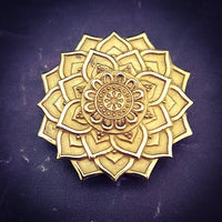 The KYRO INTERCHANGEABLE MEDALLIONS are created to wear on the KYRO COLLARS and can be effortlessly changed. In a heartbeat, you can transform a collar from gothic to girly, uptown to downtown, or casual to dramatic. This one is a bronze mandala flower. By My Secret Heart Studios