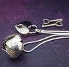 Sometimes sensual and provocative, sometimes mischievous and playful. And most times … just downright bratty, lol. A locking submissive kitten bell collar handcrafted and crafted with all the grace and discretion that My Secret Heart is known for.&nbsp;This artisan bell is hand-sawn from a sterling silver sheet, then torched, hammered, and domed into an exquisite bell. Your pet will make a delightful tinkle when you play.