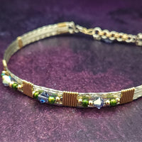 Make an unforgettable statement with our one-of-a-kind gemstone Babei collar! Crafted with sterling silver and beautiful Tanzanite gemstone crystal beads, this stunning necklace will instantly add a sophisticated yet daring touch to any look. Dare to be different and be noticed!