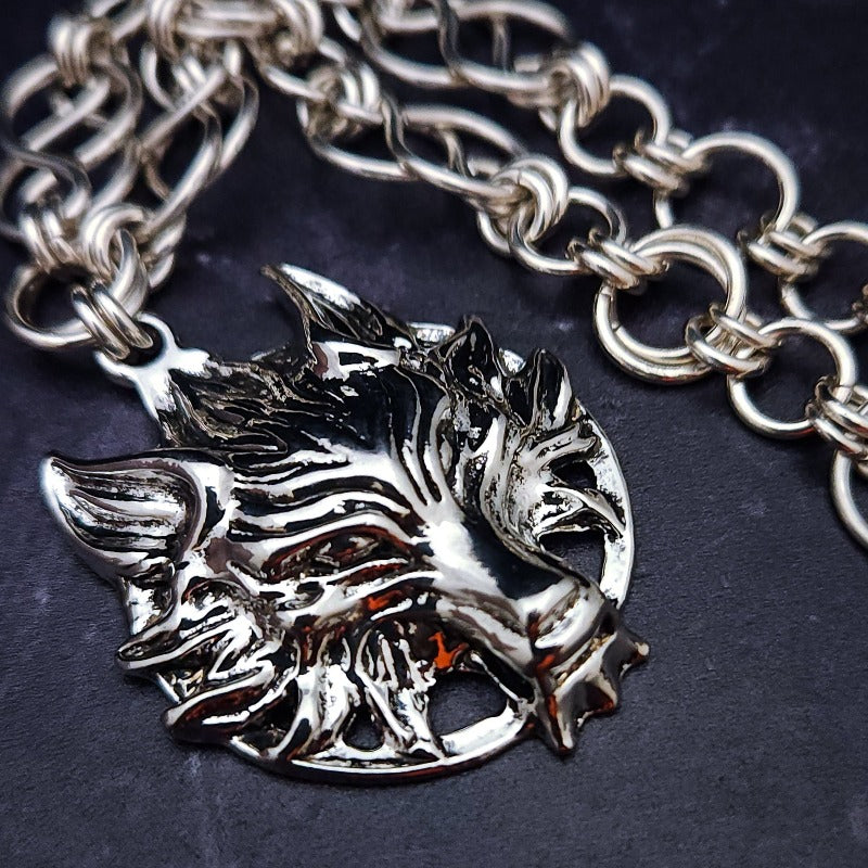 The GUNDOLF Wolf Necklace helps you tap into your inner warrior. Finished with a stainless steel wolf pendant and handcrafted sterling Celtic knot chain, this one-of-a-kind necklace provides long-lasting symbol of strength and courage.