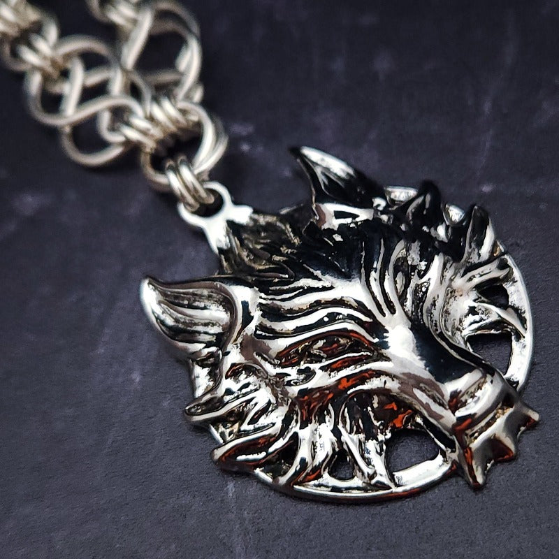 The GUNDOLF Wolf Necklace helps you tap into your inner warrior. Finished with a stainless steel wolf pendant and handcrafted sterling Celtic knot chain, this one-of-a-kind necklace provides long-lasting symbol of strength and courage.