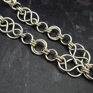 The GUNDOLF Wolf Necklace helps you tap into your inner warrior. Finished with a stainless steel wolf pendant and handcrafted sterling Celtic knot chain, this one-of-a-kind necklace provides long-lasting symbol of strength and courage.