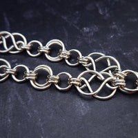 The GUNDOLF Wolf Necklace helps you tap into your inner warrior. Finished with a stainless steel wolf pendant and handcrafted sterling Celtic knot chain, this one-of-a-kind necklace provides long-lasting symbol of strength and courage.