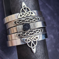 The substantial weight of The Simplicity sterling cuff lends this a sense of gravitas, while a powerful black druzy is embraced by sterling silver wraps. The simplistic design makes it a perfect companion for almost any other jewelry in your collection.  Goes beautifully with our Celtic Inspired Cuffs. By My Secret Heart Studios