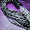 Experience the perfect balance of pleasure and pain with this BDSM Flogger in Black Leather and Glass! Stylish, luxurious, and crafted with great care, it's the classic impact toy of your kinky dreams. Personalize to your heart's content - heat it up or hit it hard - and explore a range of sensations with S&M play! Can be Monogrammed / Engraved. By My Secret Heart Studios