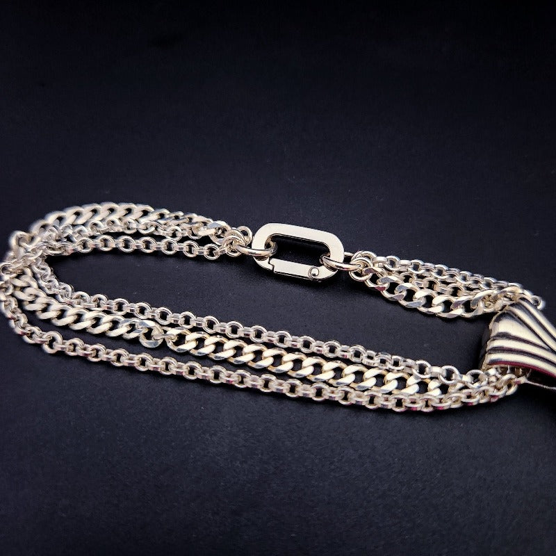 Even a Princess can be a Bitch. A sexy bracelet to celebrate submission. There is a solid HIDDEN O RING behind the heart which can accommodate a leash or be used as a connection point. The PRINCESS SLIDE can be removed and worn on most of our submissive collars, as well as worn on a chain as a pendant. Wear it locked with the small heart lock, or the stainless steel push clasp for discretion. {All included}