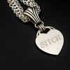 Even a Princess can be a Bitch. A sexy bracelet to celebrate submission. There is a solid HIDDEN O RING behind the heart which can accommodate a leash or be used as a connection point. The PRINCESS SLIDE can be removed and worn on most of our submissive collars, as well as worn on a chain as a pendant. Wear it locked with the small heart lock, or the stainless steel push clasp for discretion. {All included}