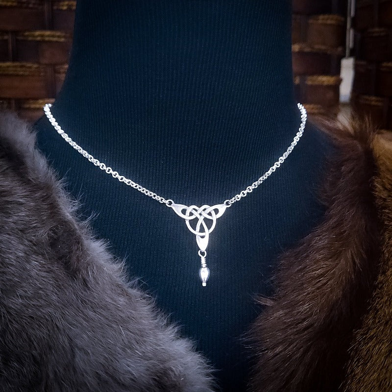 Beautifully discreet statement of Ownership. Ignite your passions with the Celtic Dance Soft Chain Collar, crafted with luxurious sterling silver! A timeless Triquetra Knot adorns the front of this chain collar with 2.7mm rolo sterling chain, evoking memories of campfire music and moonlit dancing. A piece of ancient past, present, and future - enjoy it for years!  LAYER IT! Looks amazing layered with other chains and collars! By My Secret Heart Studios