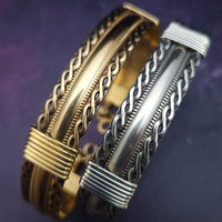 Bold, dramatic and luxurious, this KEY KEEPER BRACELETS is from our BABYLON COLLECTION. A detachable chain safely holds the key to Your submissive's lock.  Lobster clasps clip into rings attached to the cuff, which makes removing the chain and key simple. Never lose that all important, tiny key!  By My Secret Heart Studios