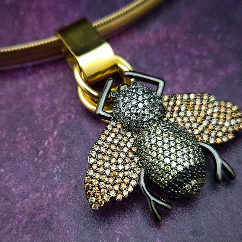 A crystal encrusted queen bee collar enhancer that can be worn alone or slid onto most of our submissive collars or chains. By My Secret Heart Studios