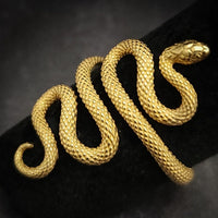 This enchanting, sinuous ring boasts a bypass design that artfully mimics a lifelike snake shape, with its head and tail curling into the ends of the ring. Easily adjustable, this ring can fit a wide range of sizes - from its original size 7 (US) to give the perfect fit.