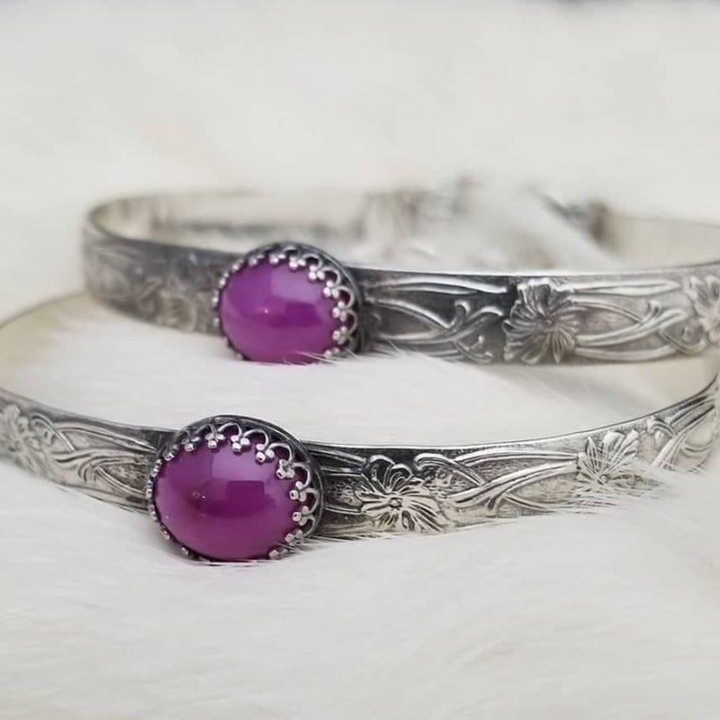 THESE LIMITED EDITION LOCKING BRACELETS are part of our SOFT and SWEET Collection and are created in a classic floral pattern of sterling silver and embellished with a luxurious Star Ruby Cabochon. A romantic, elegant way to show you Ownership / submission. Beautifully feminine and romantic. By My Secret Heart Studios