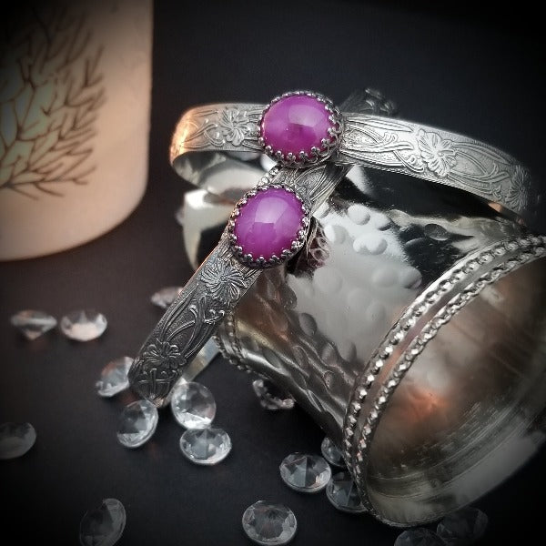 THESE LIMITED EDITION LOCKING BRACELETS are part of our SOFT and SWEET Collection and are created in a classic floral pattern of sterling silver and embellished with a luxurious Star Ruby Cabochon. A romantic, elegant way to show you Ownership / submission. Beautifully feminine and romantic. By My Secret Heart Studios