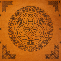 A square wooden plaque or box lid featuring a Celtic design. The center is a circular triquetra (trinity knot) motif in dark brown, surrounded by a matching circular border and decorative corner flourishes in the four corners, all on a warm orange-brown wood grain background.