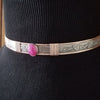 THIS LIMITED EDITION SUBMISSIVE COLLAR is part of our SOFT and SWEET Collection and is created in sterling silver and accented with Rose Gold Filled wire accents. The luxurious 12mm x 10mm Star Ruby Cabochon is hand set in a sterling silver bezel. What a luxurious way to show you Ownership / submission. 